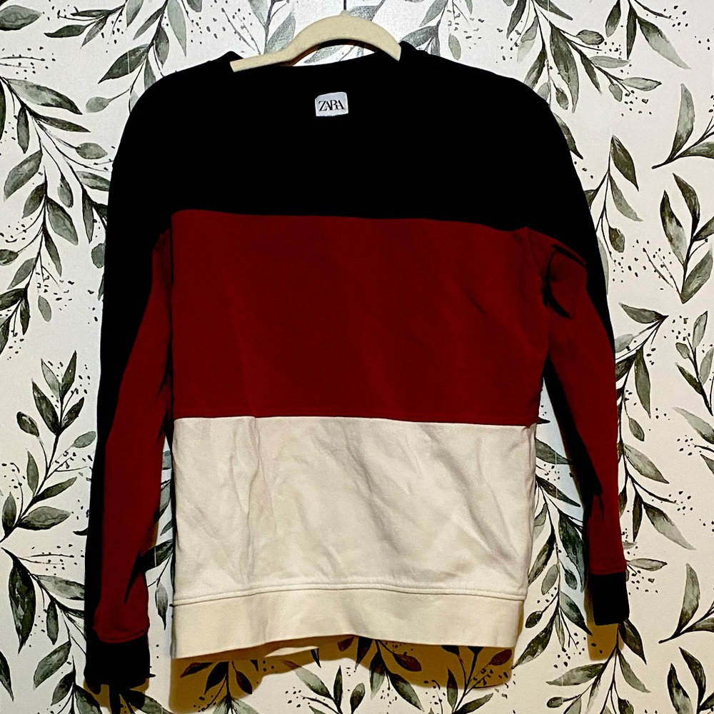 Selling my large red Zara sweater because it no longer fits my style.